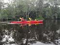 Paddling our Excursion down the Lukenie. JJ is taking a breack in the pirogue